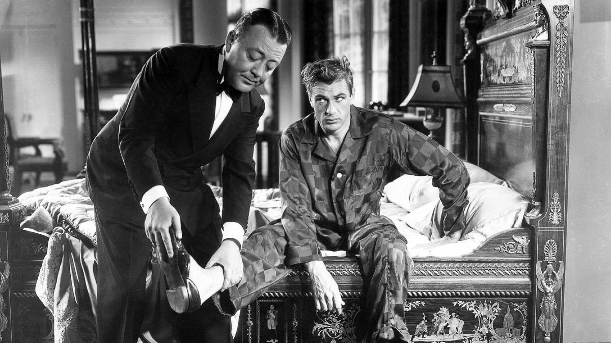 Gary Cooper looking askance at his newly acquired butler in a scene from the Frank Capra film Mr. Deeds Goes to Town