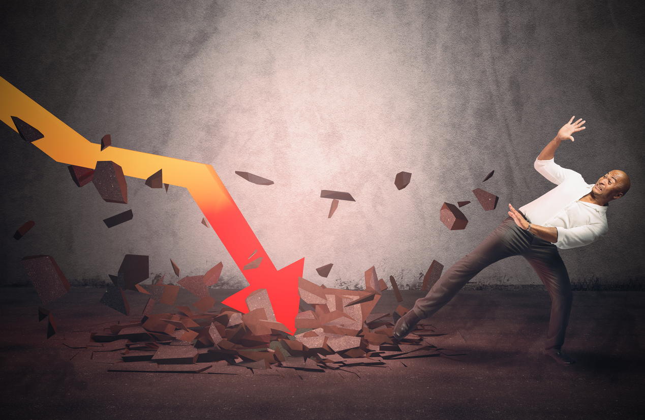 Businessman frightened by a stats sudden collapse