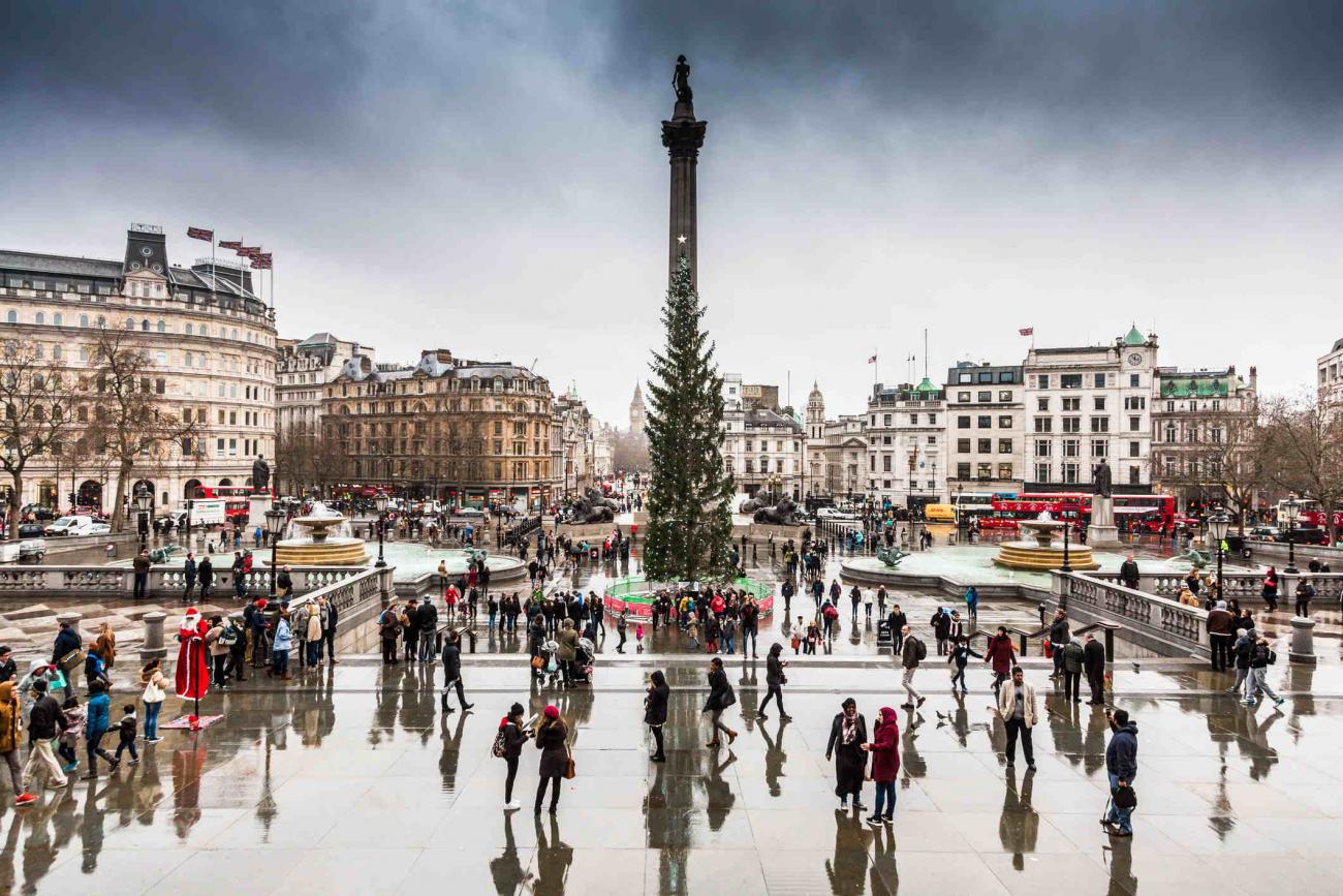 Tourists by the Christmas Tree in Trafalgar Square